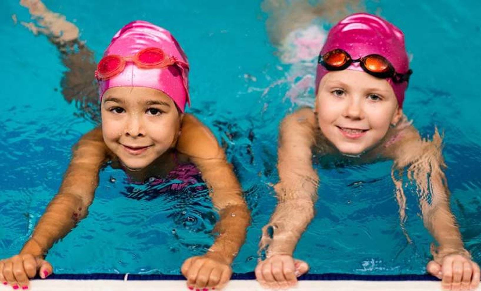 two children in a swimming pool