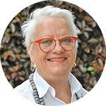 profile image of woman with red glasses